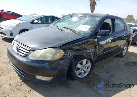 2003 Toyota Corolla S z USA, uszkodzony, nr VIN 1NXBR32E43Z107862